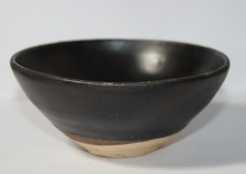 A brown glazed Honan type Cizhou teabowl.