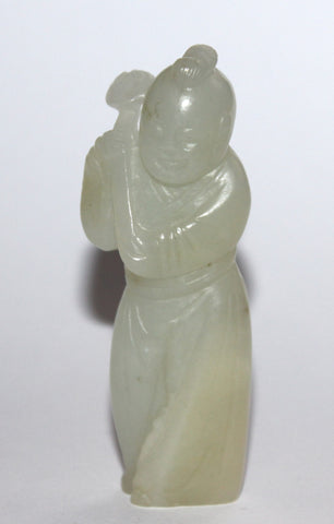 A Chinese jade figure of a boy. 18th Century.
