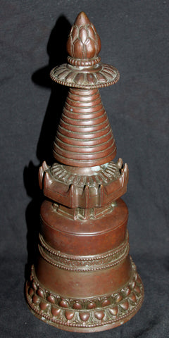 A Tibetan bronze stupa.