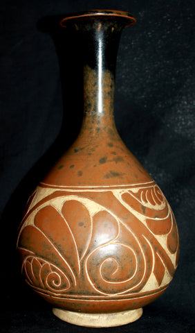 A carved Cizhou vase.