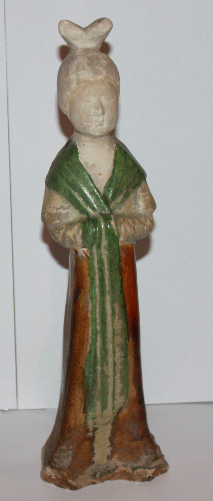 A figure of a lady in brown and green glazes. 6/7th Century AD. - asianartlondon