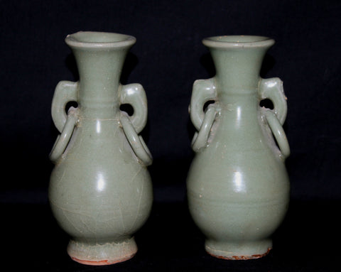 A pair of celadon twin handled vases.