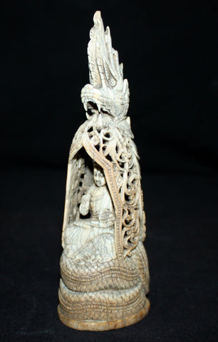 A Ceylonese ivory carving.