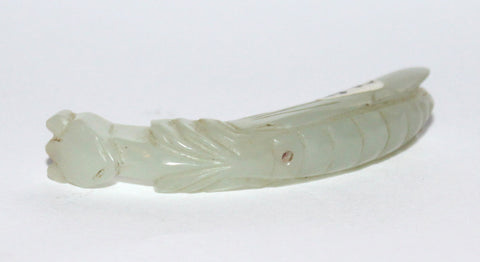 A jade praying mantis pendant.