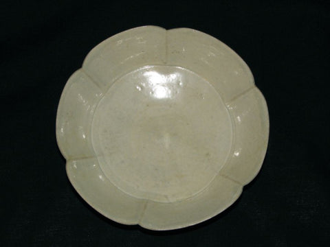 A Qingbai fluted saucer.