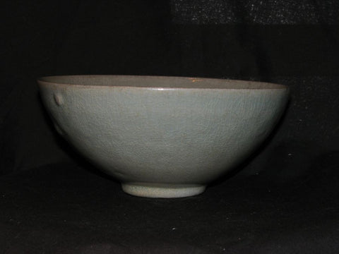 A Korean celadon moulded bowl.