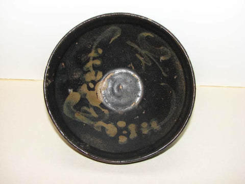 A Jizhou 'moon and prunus' tea bowl.