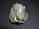 A celadon jade carving of 'toad and pomegranate' group. - asianartlondon
